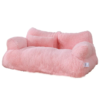 Soft pink plush pet sofa with a comfortable pillow, perfect for pampering your cat or small dog with a touch of luxury.