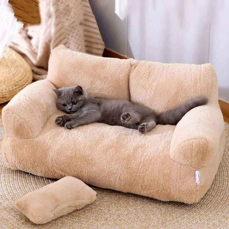 Gray cat stretched out in bliss on a plush brown pet sofa, the epitome of feline relaxation and comfort.
