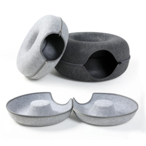 Two-tone grey wool felt cat tunnel beds displayed side by side, one dark and one light grey, with a unique zipper feature that separates into two halves.
