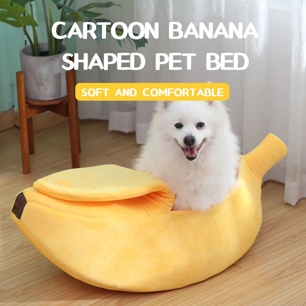 Adorable white fluffy dog lounging inside a vibrant yellow banana-shaped pet bed, looking cozy and happy. 