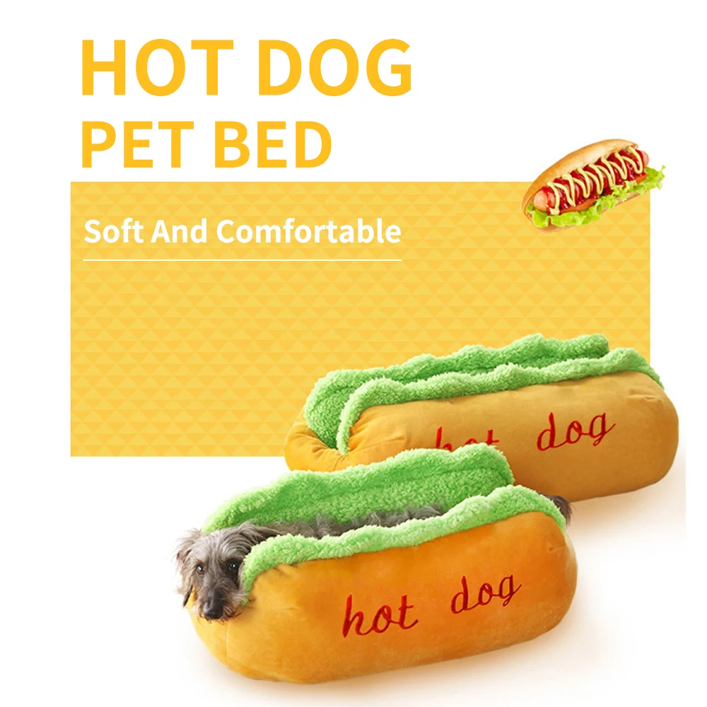 Cuddly Dog Snuggled in a Hot Dog Shaped Pet Bed Next to a Cartoon Hot Dog.