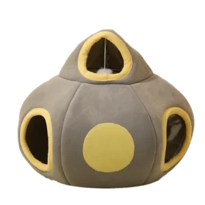A grey UFO-shaped cat bed with a plush finish, featuring a large central opening on top and multiple round portals on the sides, measuring 50 cm wide by 35 cm high, highlighted with soft yellow accents.