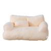 Elegant light beige pet sofa bed with soft pillow, designed for supreme comfort of small to medium-sized pets.