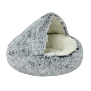 Luxurious faux fur pet bed in a cozy cave design, with plush interior cushioning, inviting pets for a warm, serene snuggle.